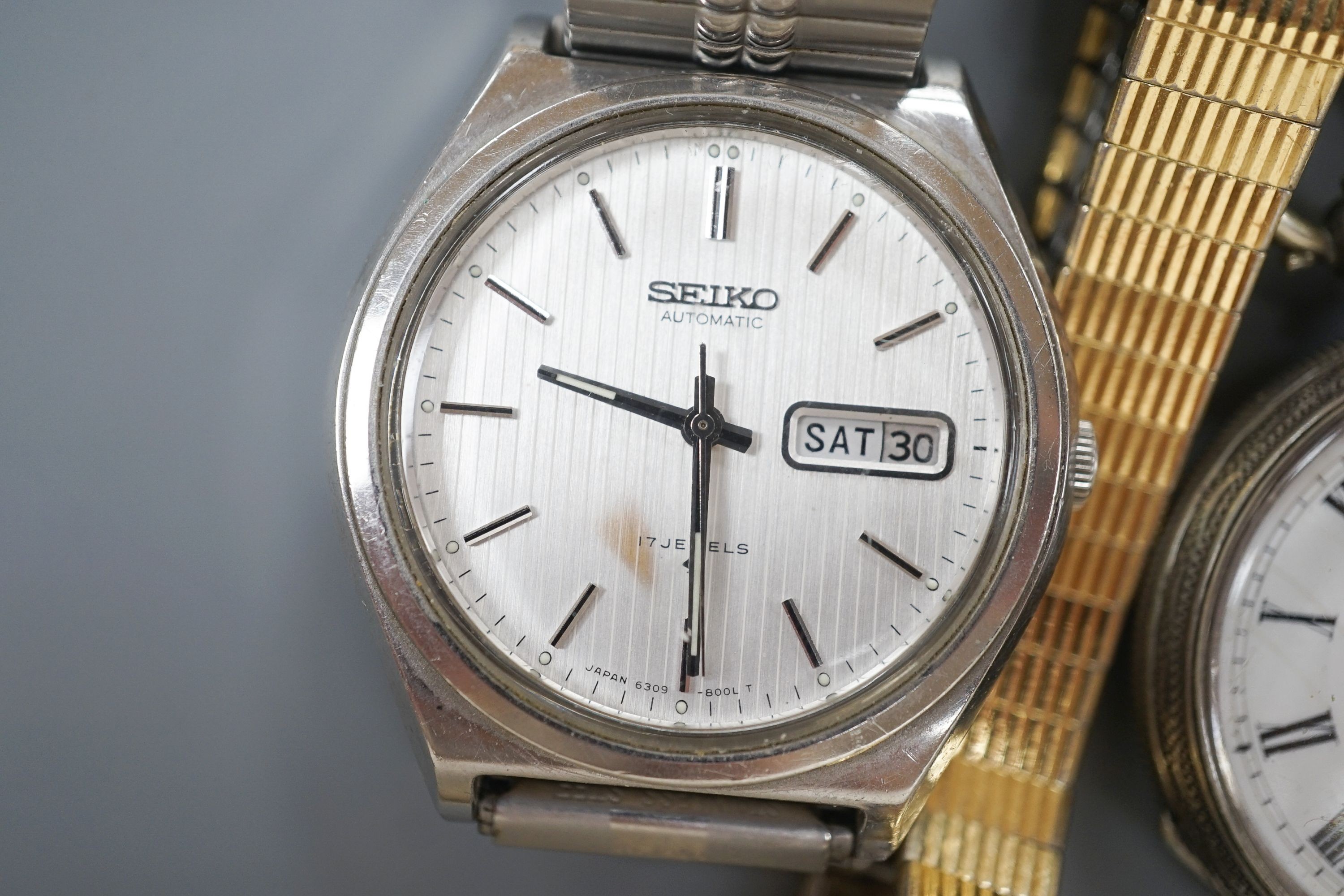 A chrome cased Guinness Time pocket watch, two wrist watches including Favre-Leuba and an 800 fob watch.